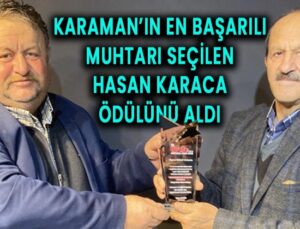 Karaman’ın en başarılı muhtarı seçilen Hasan Karaca ödülünü aldı