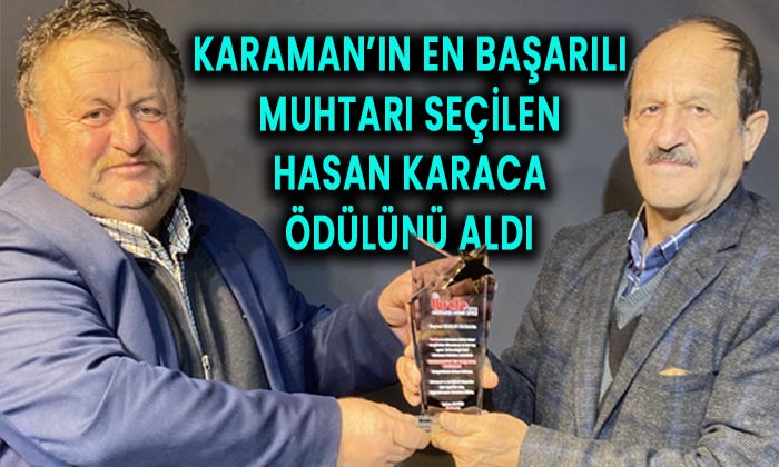 Karaman’ın en başarılı muhtarı seçilen Hasan Karaca ödülünü aldı